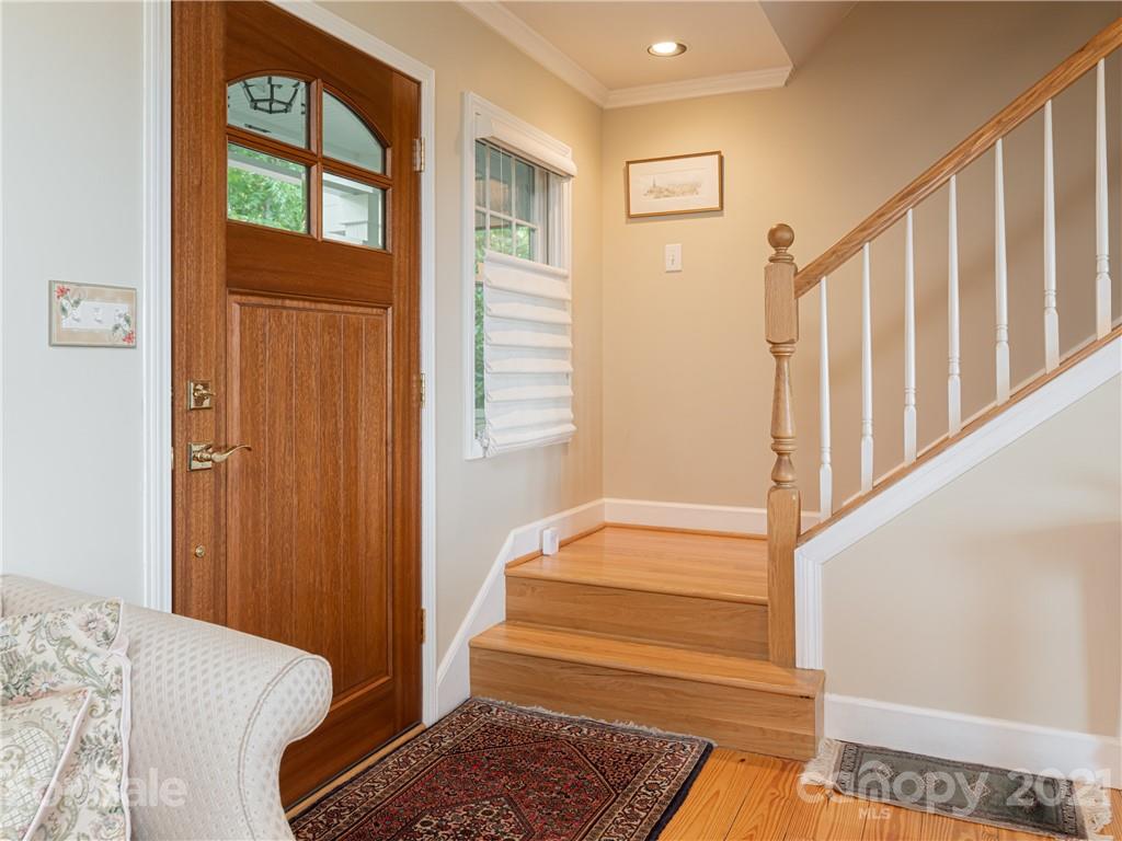 10 Powder Ridge Drive Asheville, NC 28803 - Photo 6 of 46 a bedroom with a bed and a window with couch