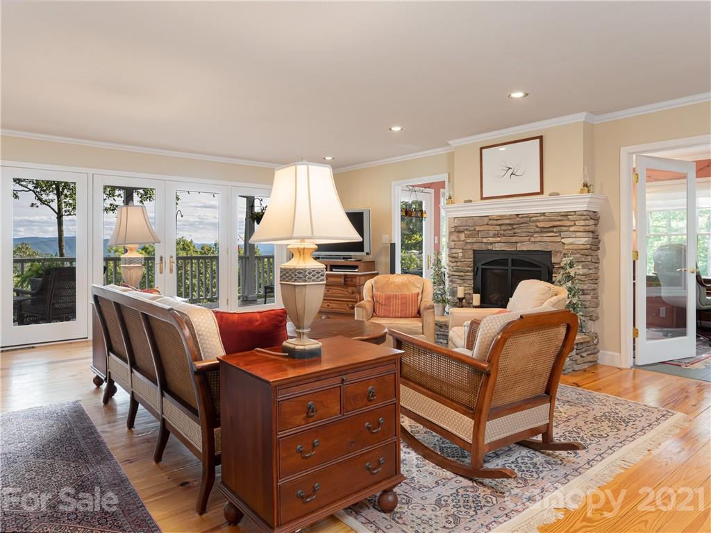 10 Powder Ridge Drive Asheville, NC 28803 - Photo 7 of 46 a living room with furniture fireplace and a flat screen tv