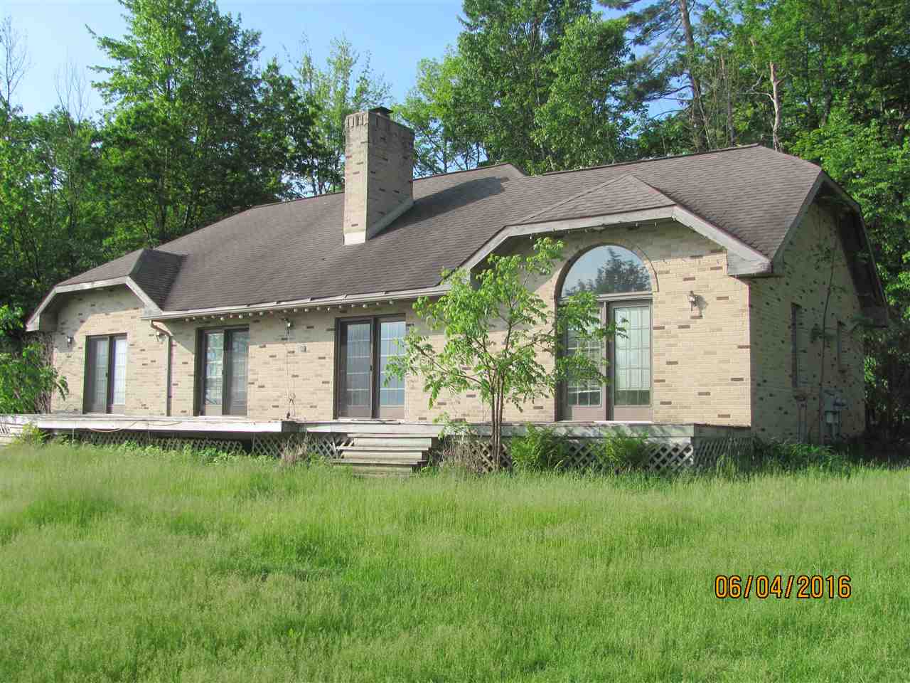 8610 Skegemog Point Road Williamsburg, MI 49690 - Photo 1 of 29 1822887.JPG