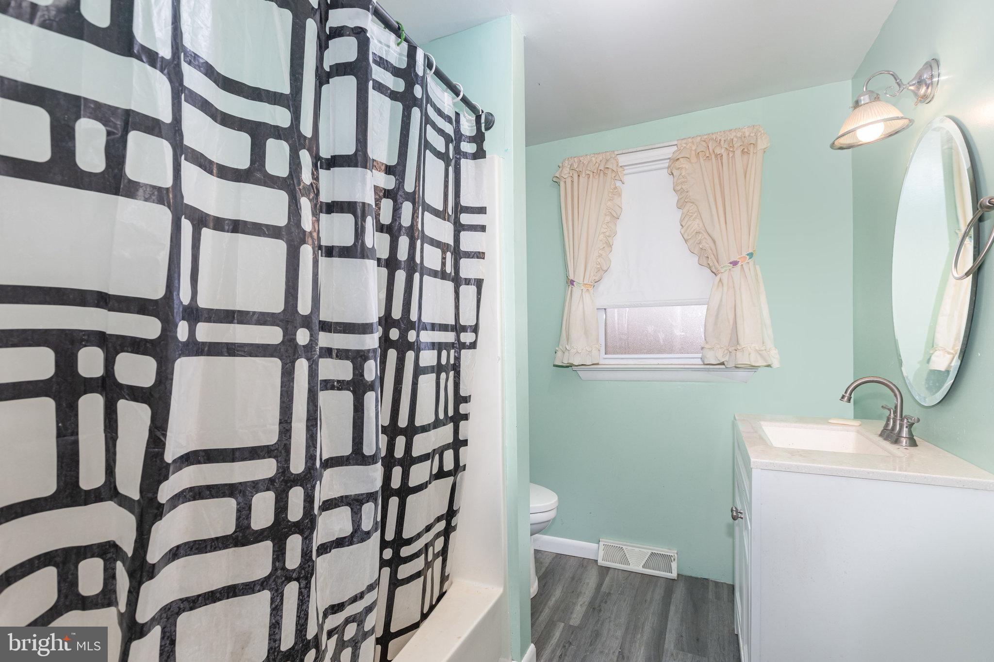 93 Beard Road Enola, PA 17025 - Photo 11 of 31 a bathroom with a sink and a mirror