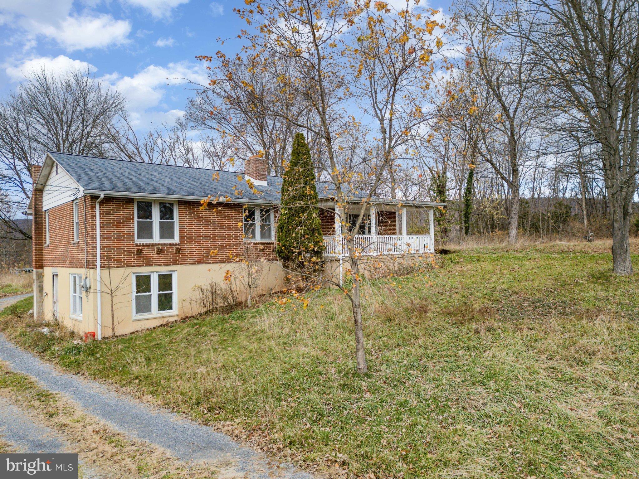 93 Beard Road Enola, PA 17025 - Photo 19 of 31 a front view of a house with a yard