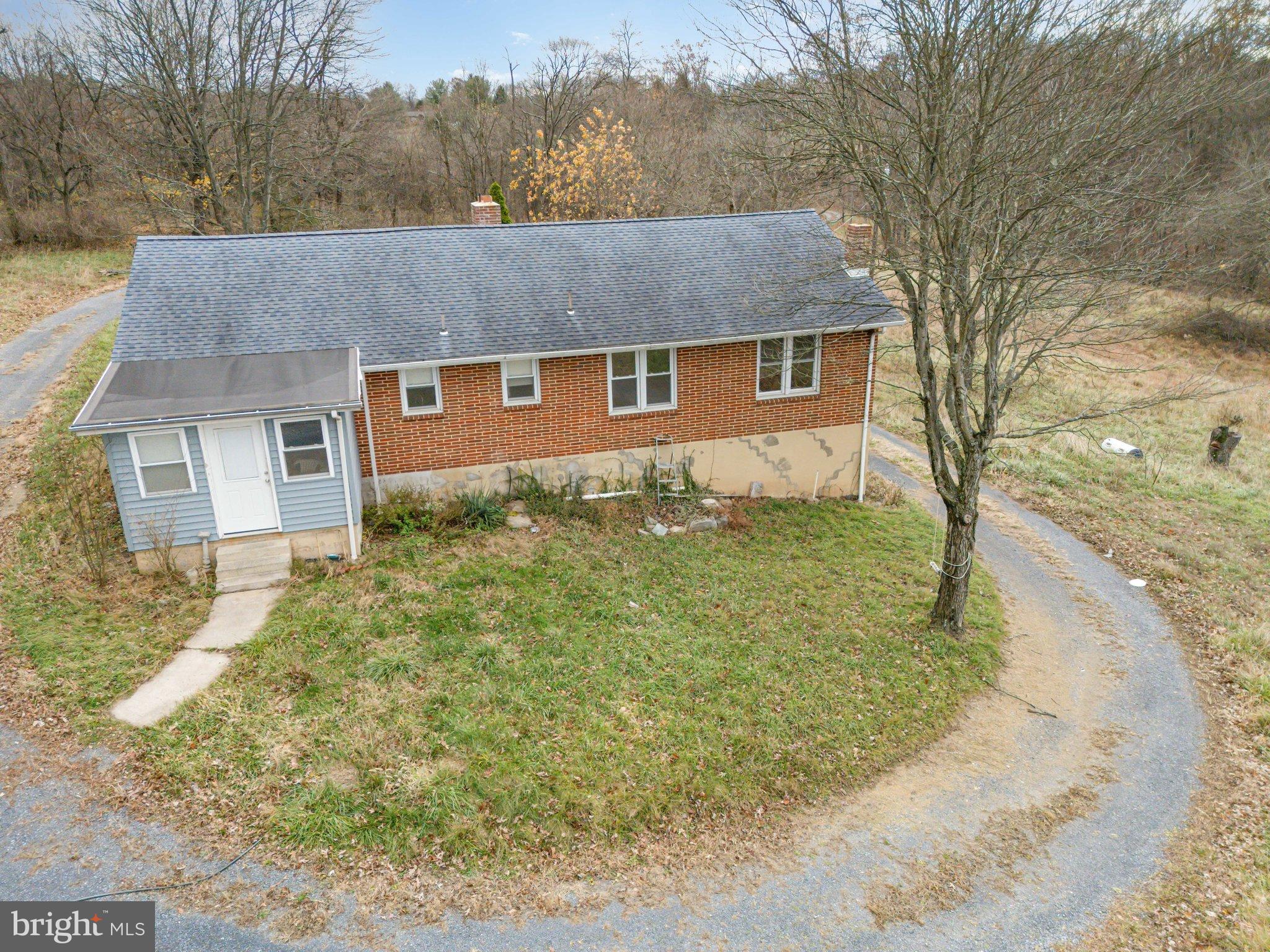 93 Beard Road Enola, PA 17025 - Photo 21 of 31 a view of a yard in front of a house with large tree