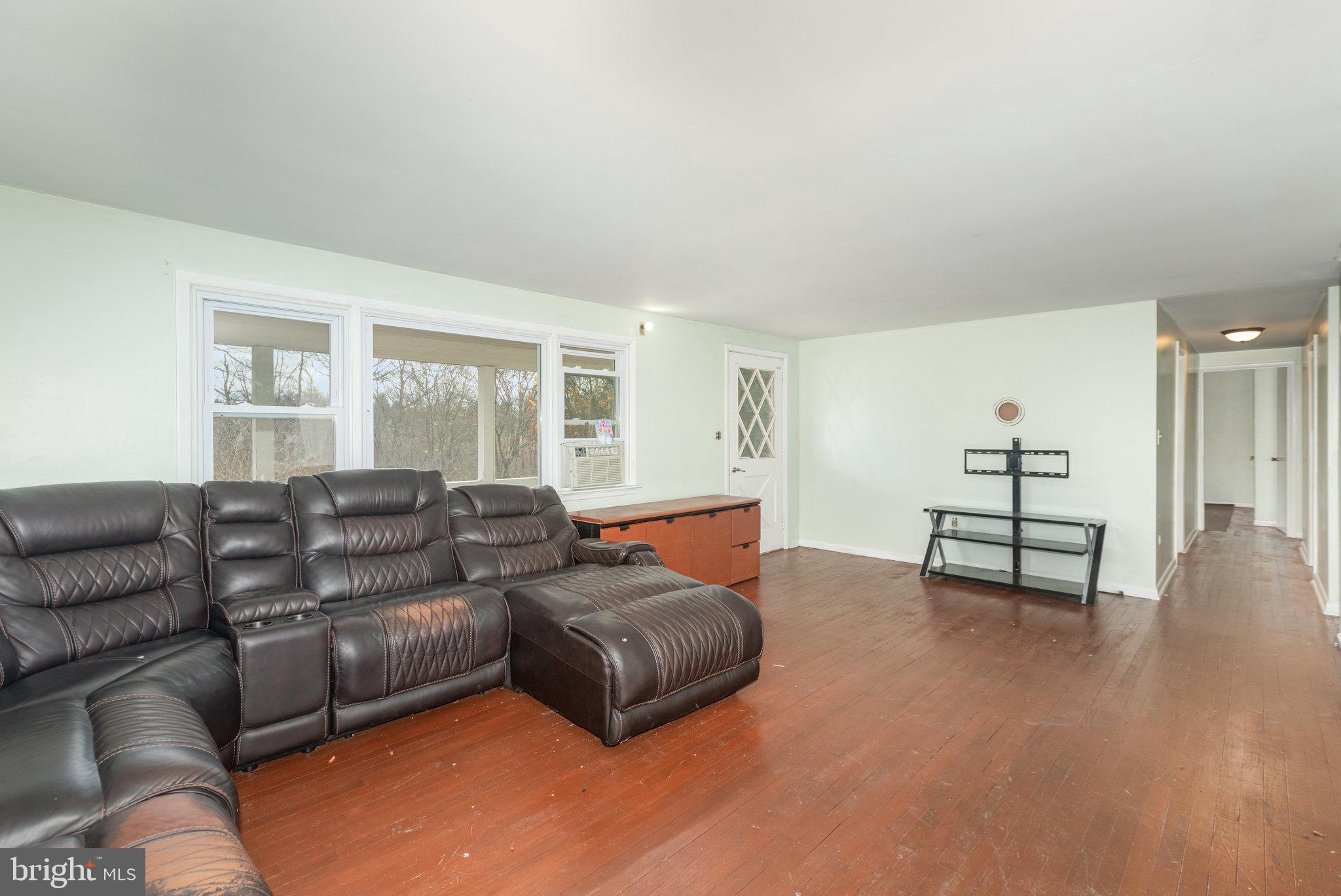 93 Beard Road Enola, PA 17025 - Photo 3 of 31 a living room with furniture and a wooden floor