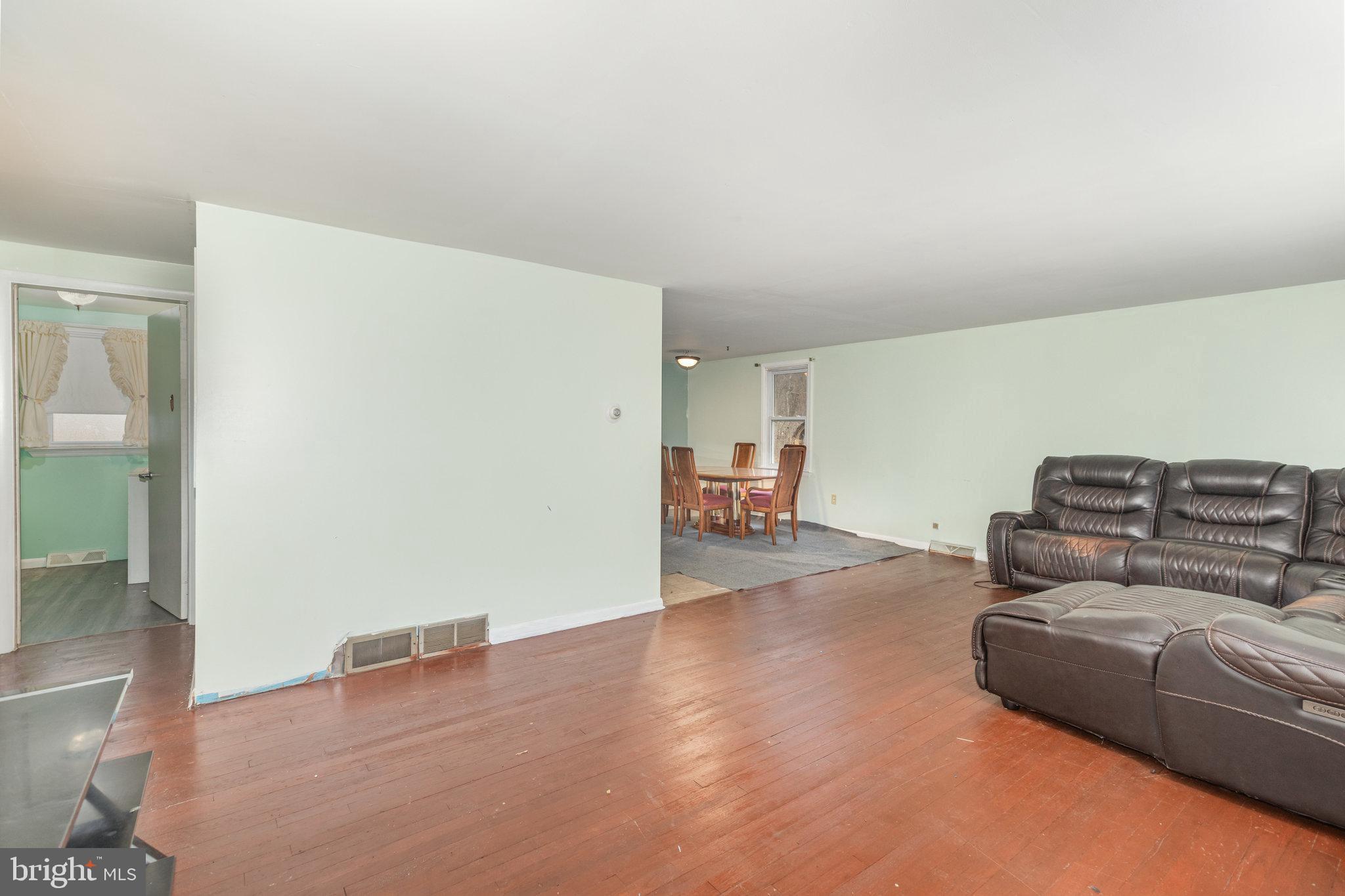 93 Beard Road Enola, PA 17025 - Photo 4 of 31 a living room with furniture and a wooden floor