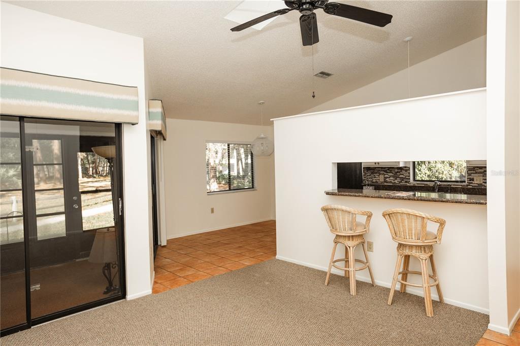 9410 Nakoma Way, Unit H Weeki Wachee, FL 34613 - Photo 13 of 29 a workspace with a tv
