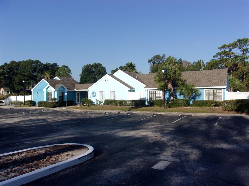 9410 Nakoma Way, Unit H Weeki Wachee, FL 34613 - Photo 5 of 29 a view of street with house on its side