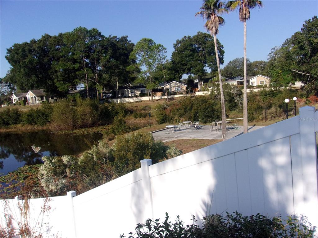 9410 Nakoma Way, Unit H Weeki Wachee, FL 34613 - Photo 8 of 29 a view of a lake view