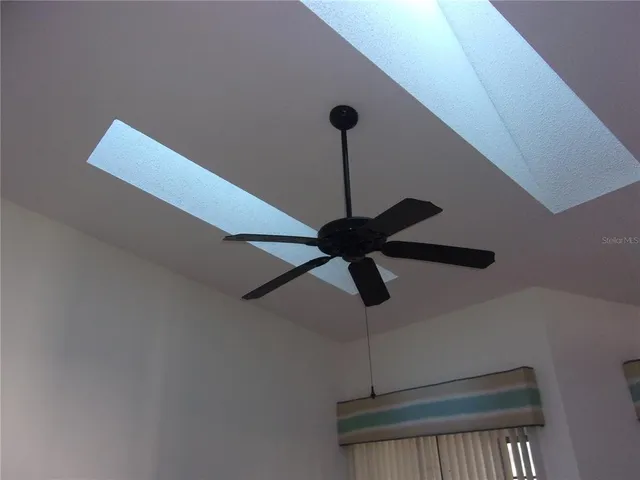 a view of a room with an empty space