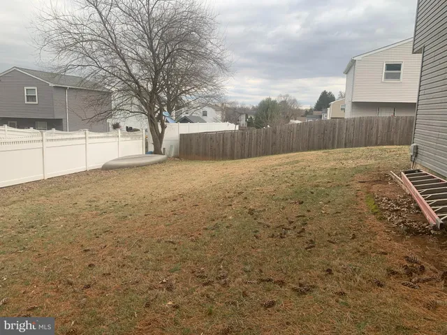 a bathroom with a sink and a yard