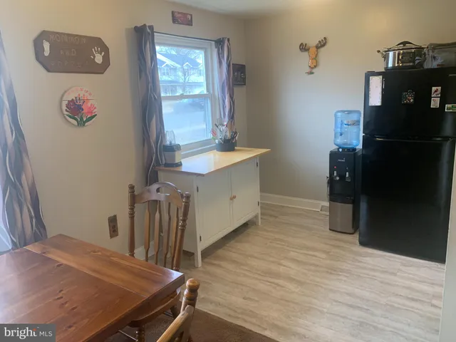 a bed room with a bed and a window