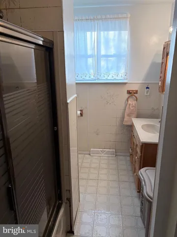 a bathroom with a sink and toilet