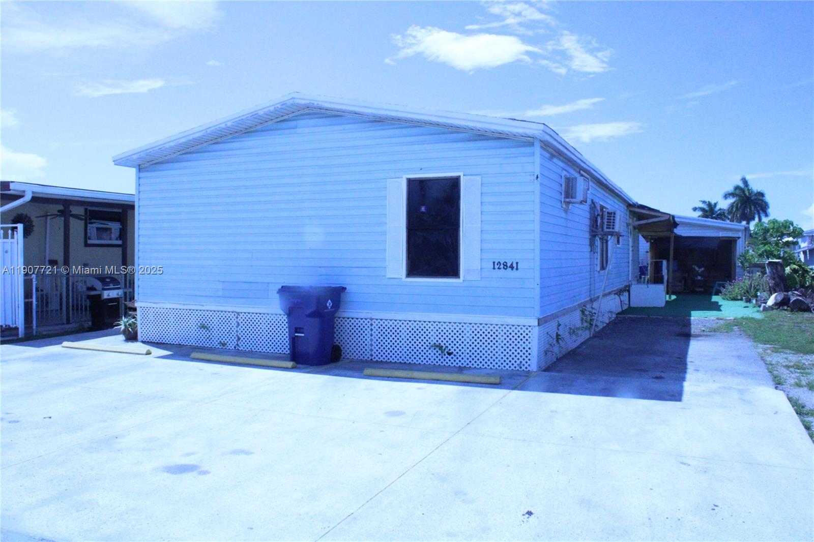 a view of an empty room with a fireplace