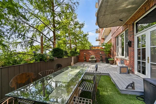 a view of swimming pool with outdoor seating
