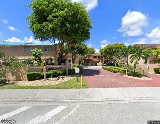 a view of street with houses