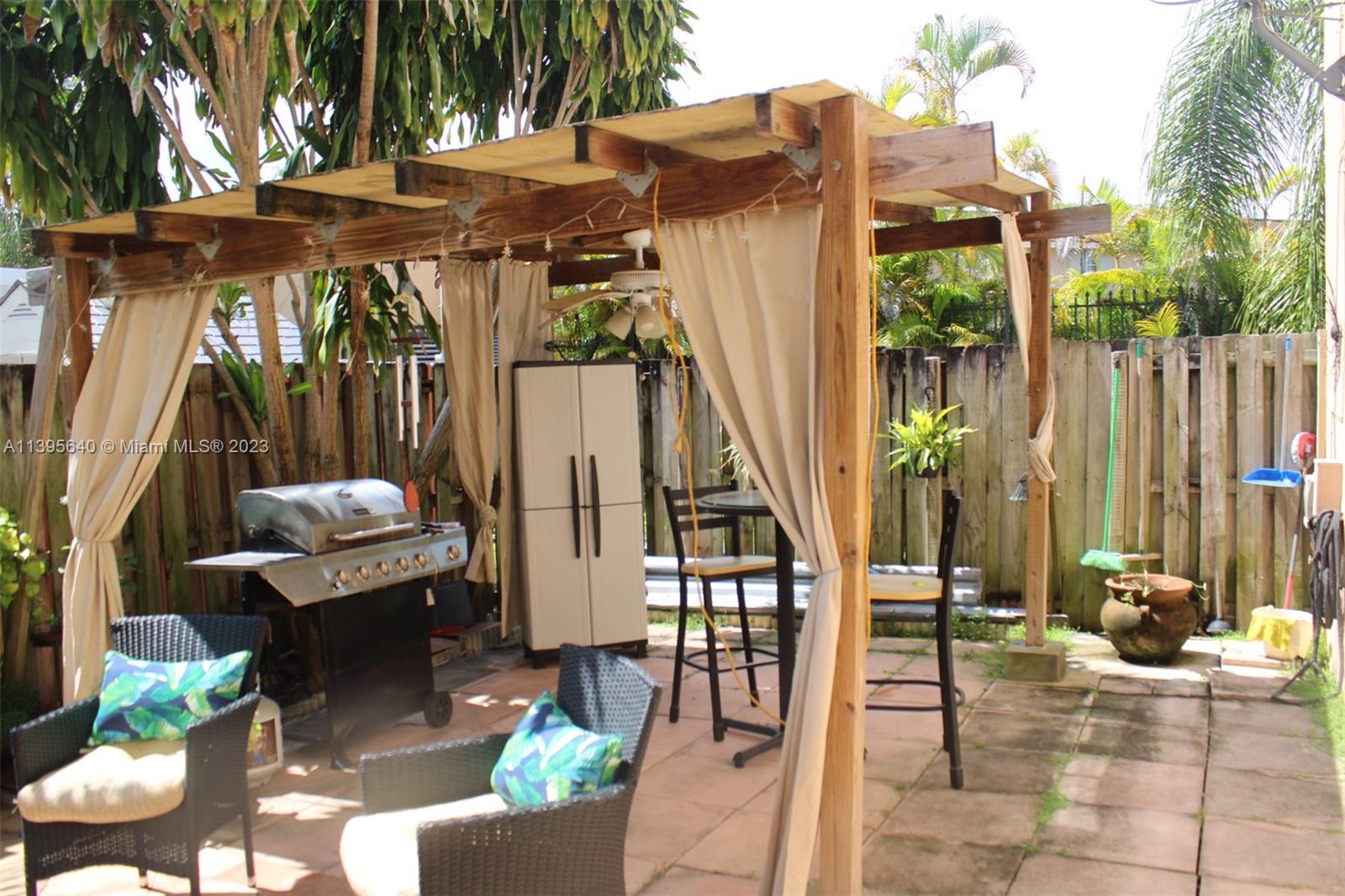 13475 Southwest 62nd Street, Unit 5 Miami, FL 33183 - Photo 19 of 32 a view of outdoor space yard and patio