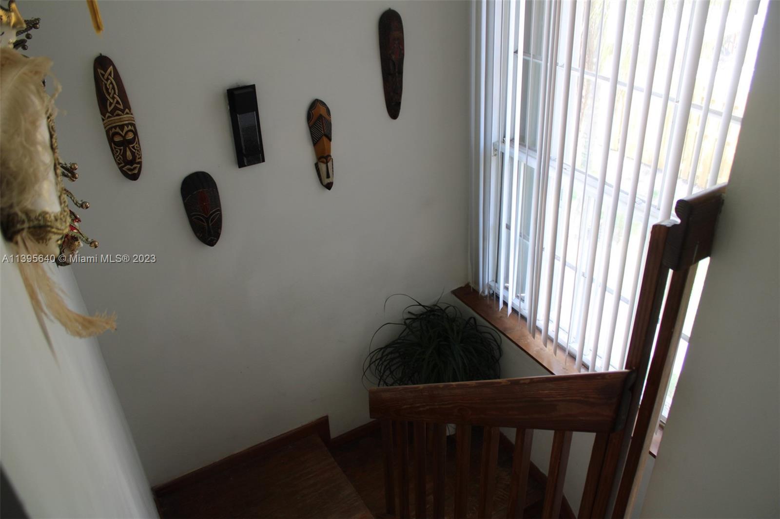 13475 Southwest 62nd Street, Unit 5 Miami, FL 33183 - Photo 23 of 32 a bathroom with a shower