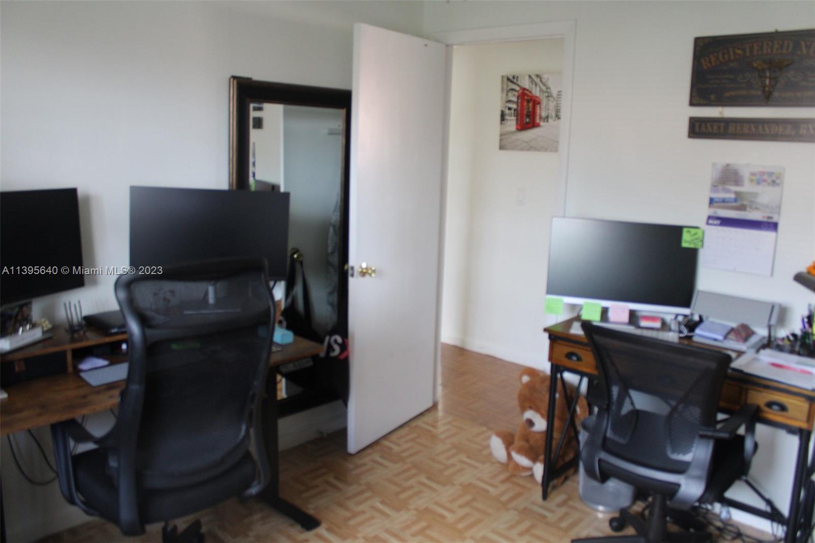 13475 Southwest 62nd Street, Unit 5 Miami, FL 33183 - Photo 27 of 32 a view of a workspace with furniture and a window