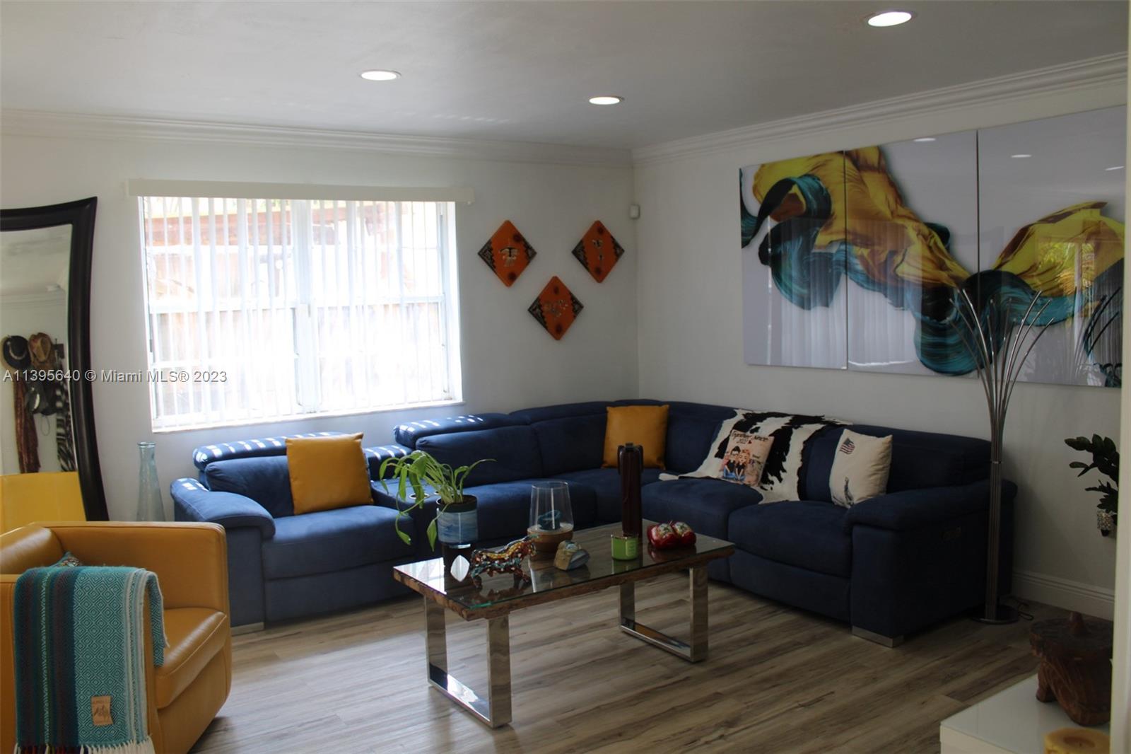 13475 Southwest 62nd Street, Unit 5 Miami, FL 33183 - Photo 5 of 32 a living room with furniture and a large window