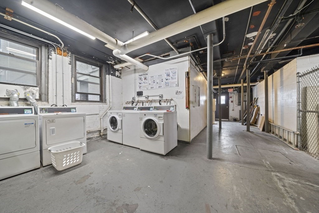 1564 Commonwealth Avenue, Unit 3 Boston, MA 02135 - Photo 9 of 9 a utility room with dryer and washer