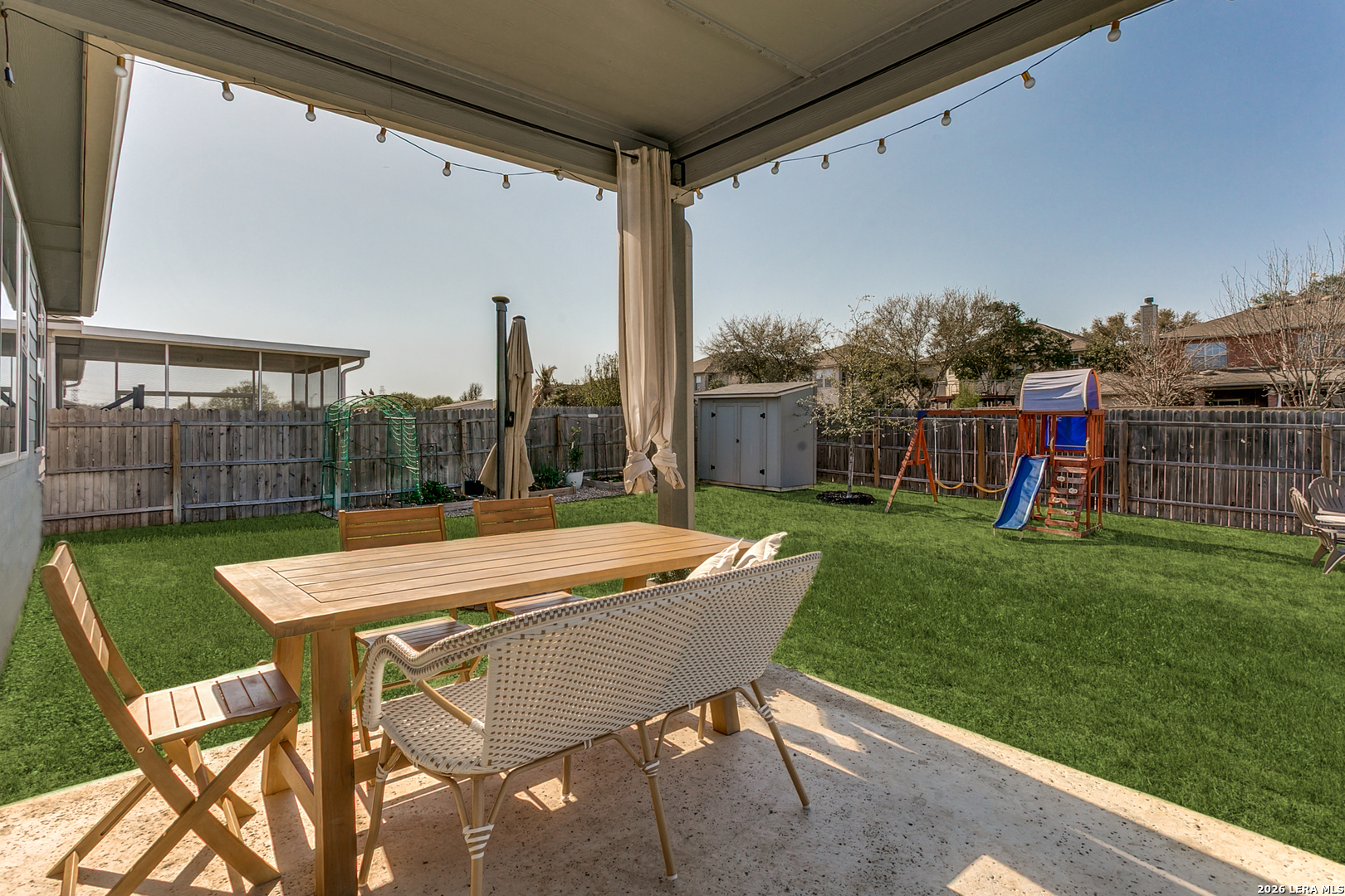 7350 Walkers Loop Live Oak, TX 78233 - Photo 20 of 23 a view of a backyard with sitting area