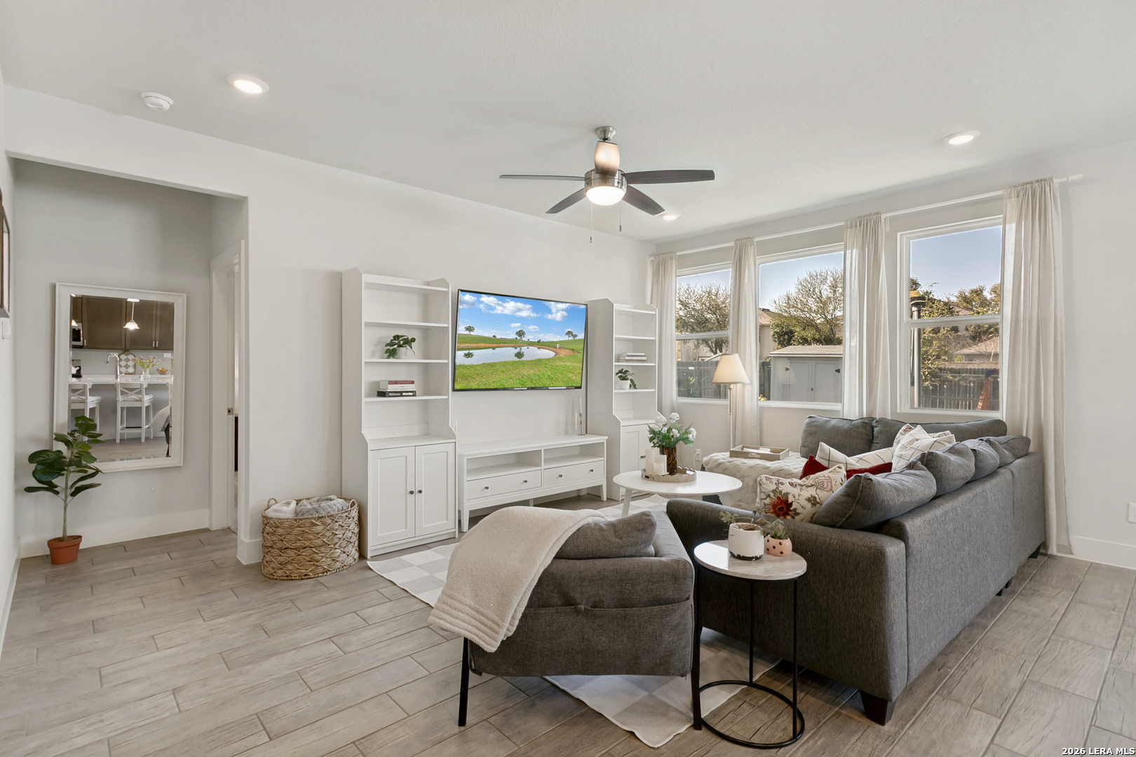 7350 Walkers Loop Live Oak, TX 78233 - Photo 5 of 23 a living room with furniture and wooden floor