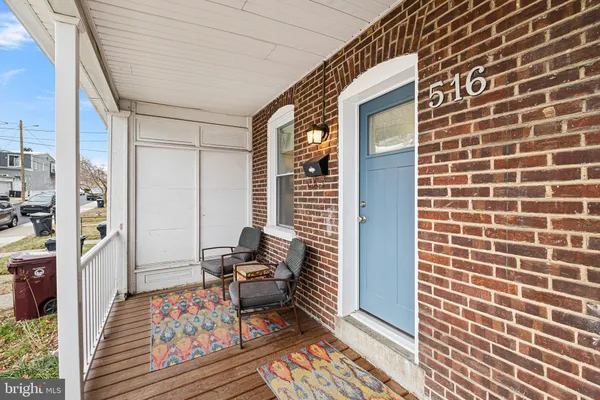 a balcony view with a outdoor seating space