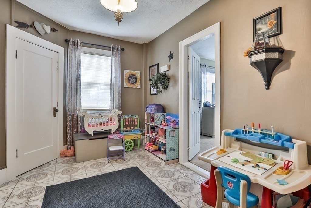 50 Mission Road Tyngsborough, MA 01879 - Photo 17 of 41 a bedroom with furniture and a window