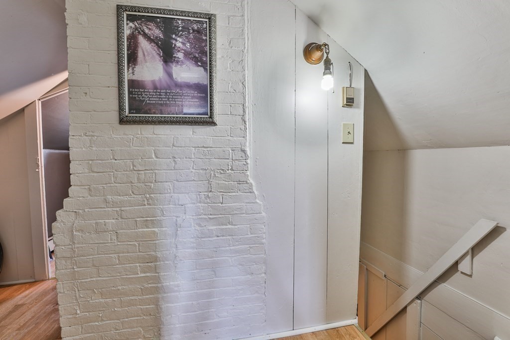 50 Mission Road Tyngsborough, MA 01879 - Photo 20 of 41 a view of a hallway with paintings on the wall