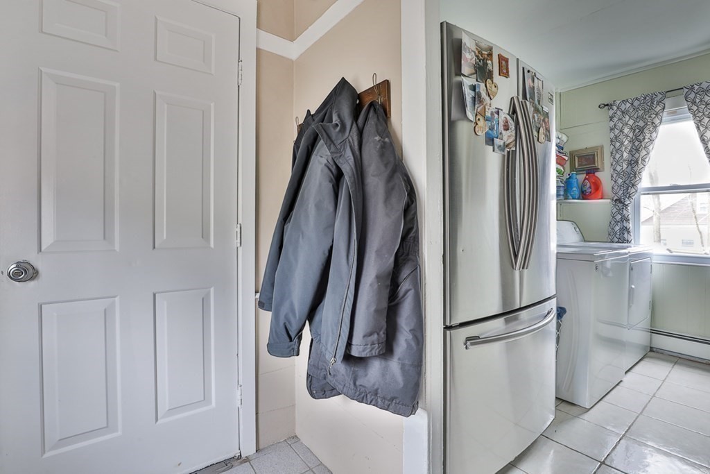 50 Mission Road Tyngsborough, MA 01879 - Photo 23 of 41 a view of walk in closet with clothes and shoes