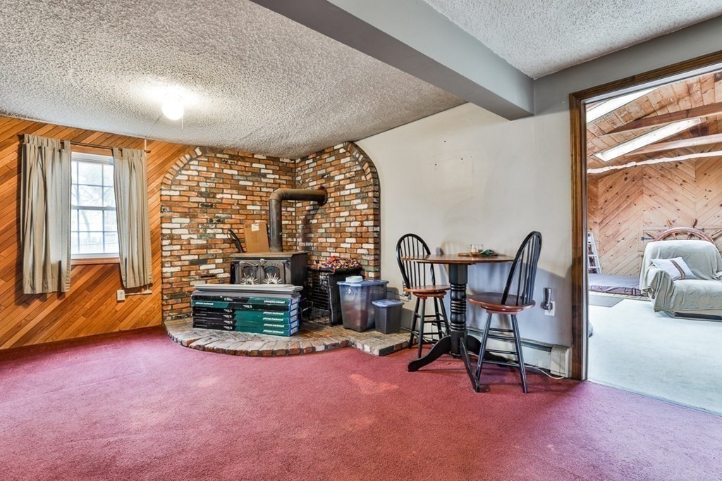 50 Mission Road Tyngsborough, MA 01879 - Photo 25 of 41 a view of a livingroom with furniture and a large window