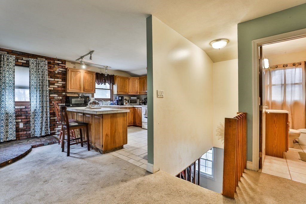50 Mission Road Tyngsborough, MA 01879 - Photo 29 of 41 a view of kitchen with furniture and refrigerator