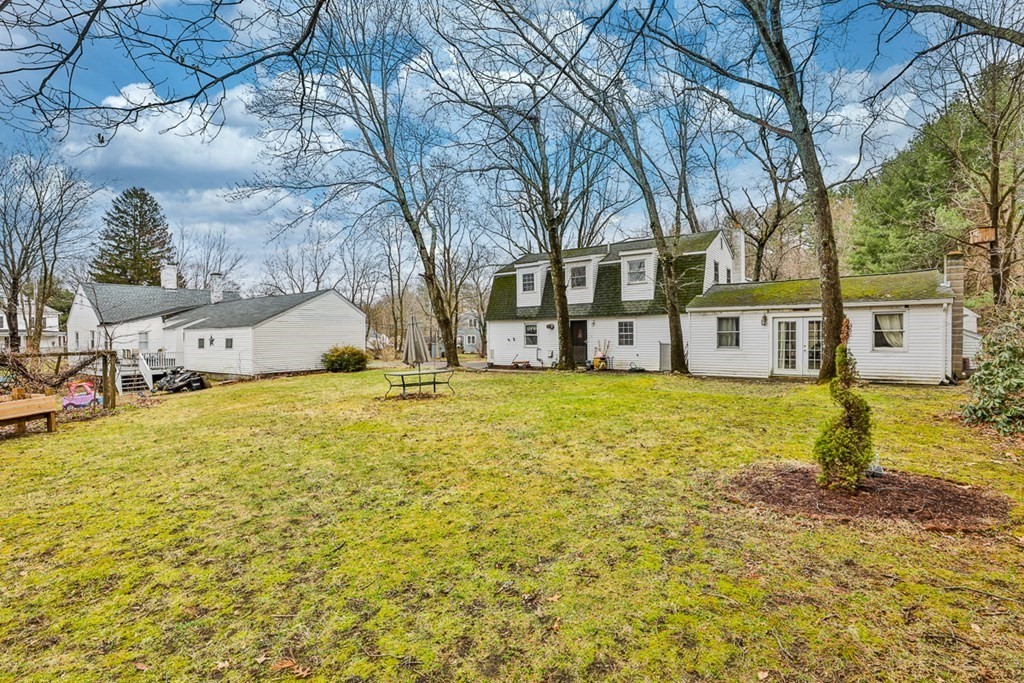 50 Mission Road Tyngsborough, MA 01879 - Photo 3 of 41 a house view with swimming pool in front of it