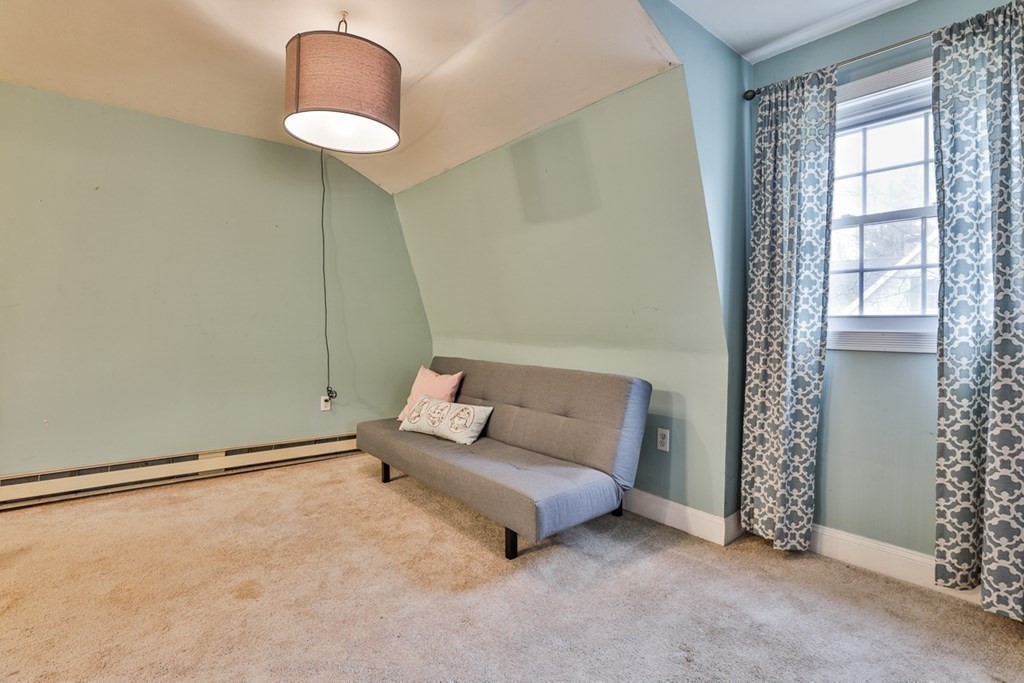 50 Mission Road Tyngsborough, MA 01879 - Photo 31 of 41 a living room with furniture and a window