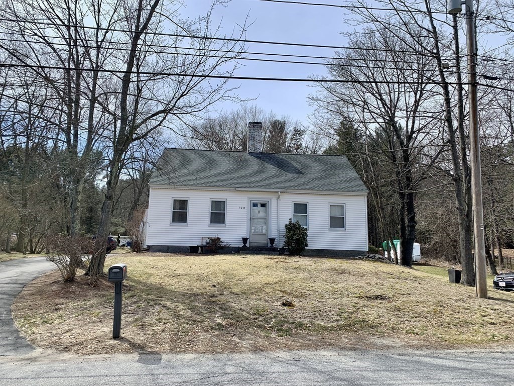 50 Mission Road Tyngsborough, MA 01879 - Photo 40 of 41 a view of a house with a yard covered in snow