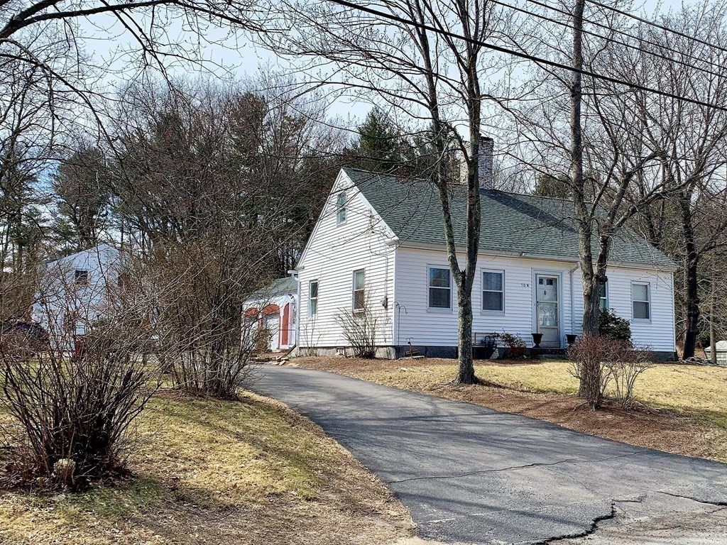 50 Mission Road Tyngsborough, MA 01879 - Photo 41 of 41 a view of a white house next to a road and yard