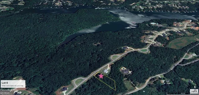 a wooden bench with view of trees