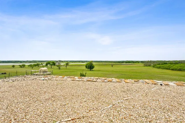 a view of a water fountain and a lake view