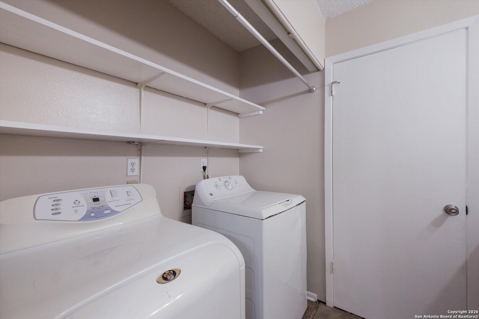 8424 8th Street Converse, TX 78109 - Photo 18 of 22 a utility room with dryer and washer
