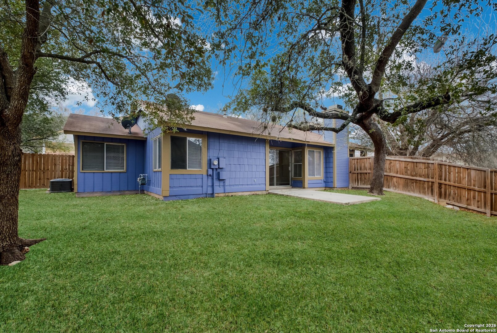 8424 8th Street Converse, TX 78109 - Photo 21 of 22 a front view of house with yard and green space