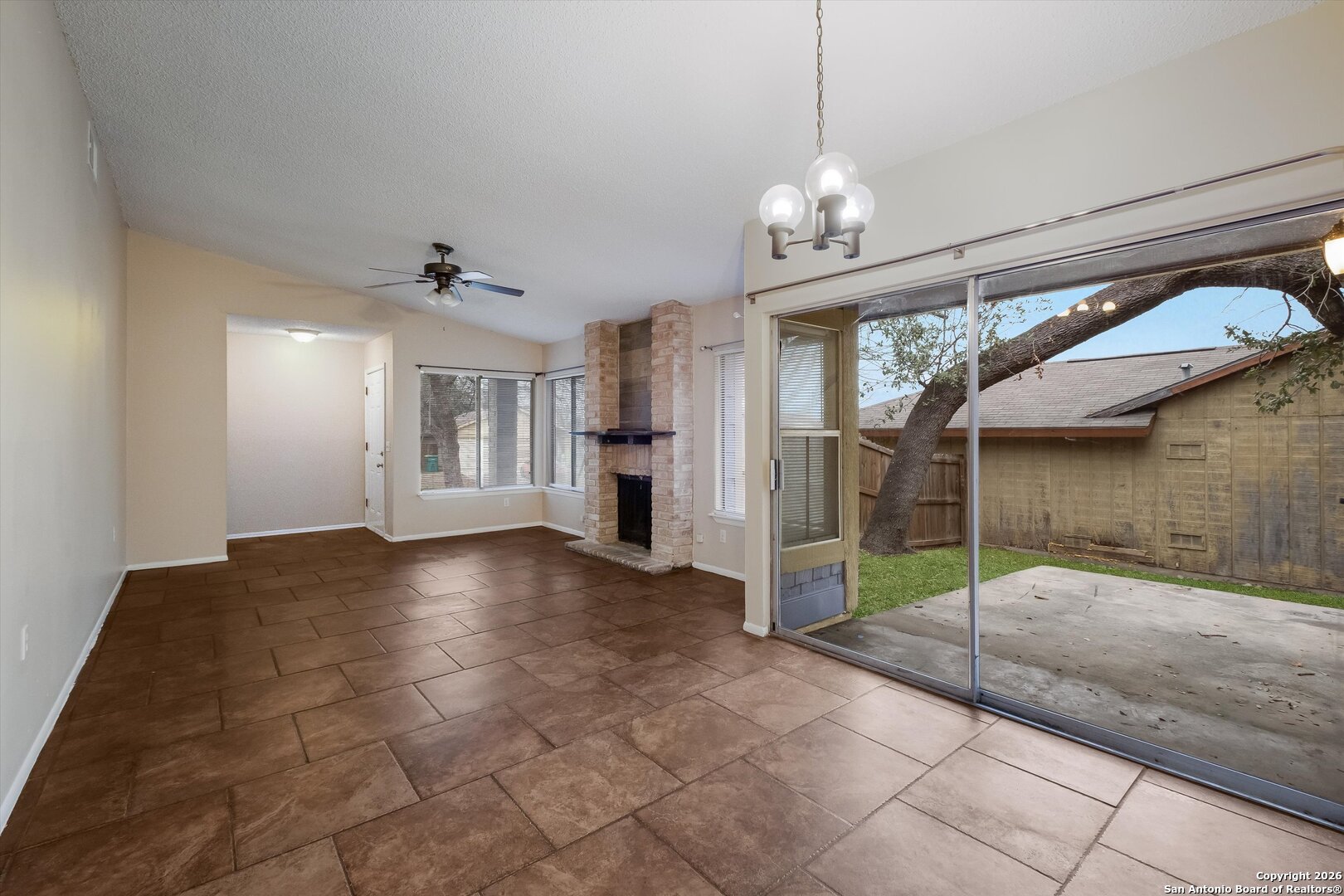 8424 8th Street Converse, TX 78109 - Photo 8 of 22 a view of an empty room with a window