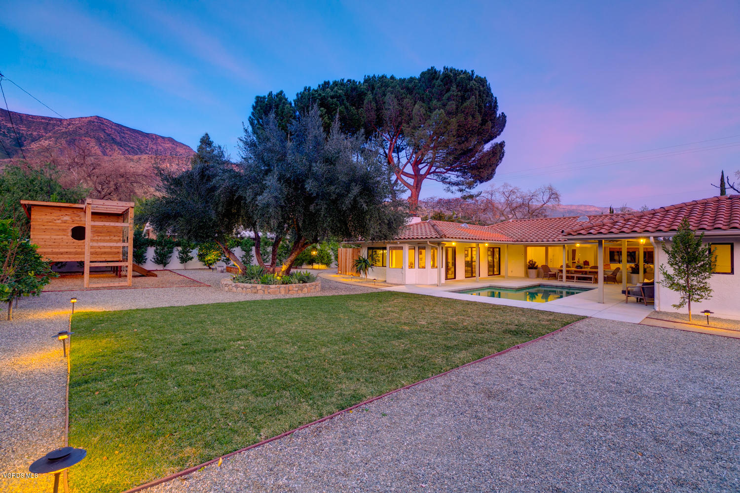 1203 Daly Road Ojai, CA 93023 - Photo 1 of 18 a view of a big yard with a house