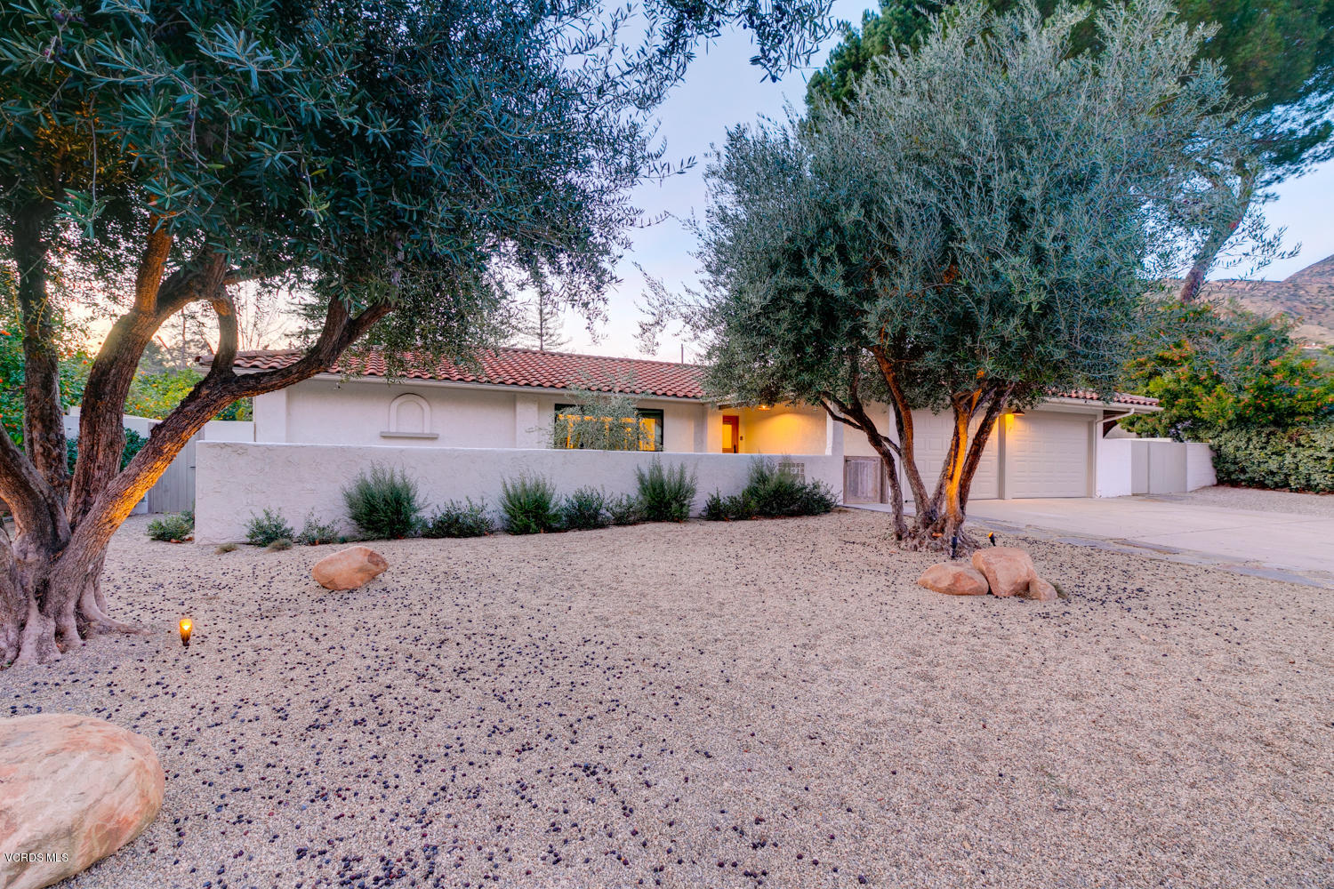 1203 Daly Road Ojai, CA 93023 - Photo 3 of 18 a view of a house with a tree in the background