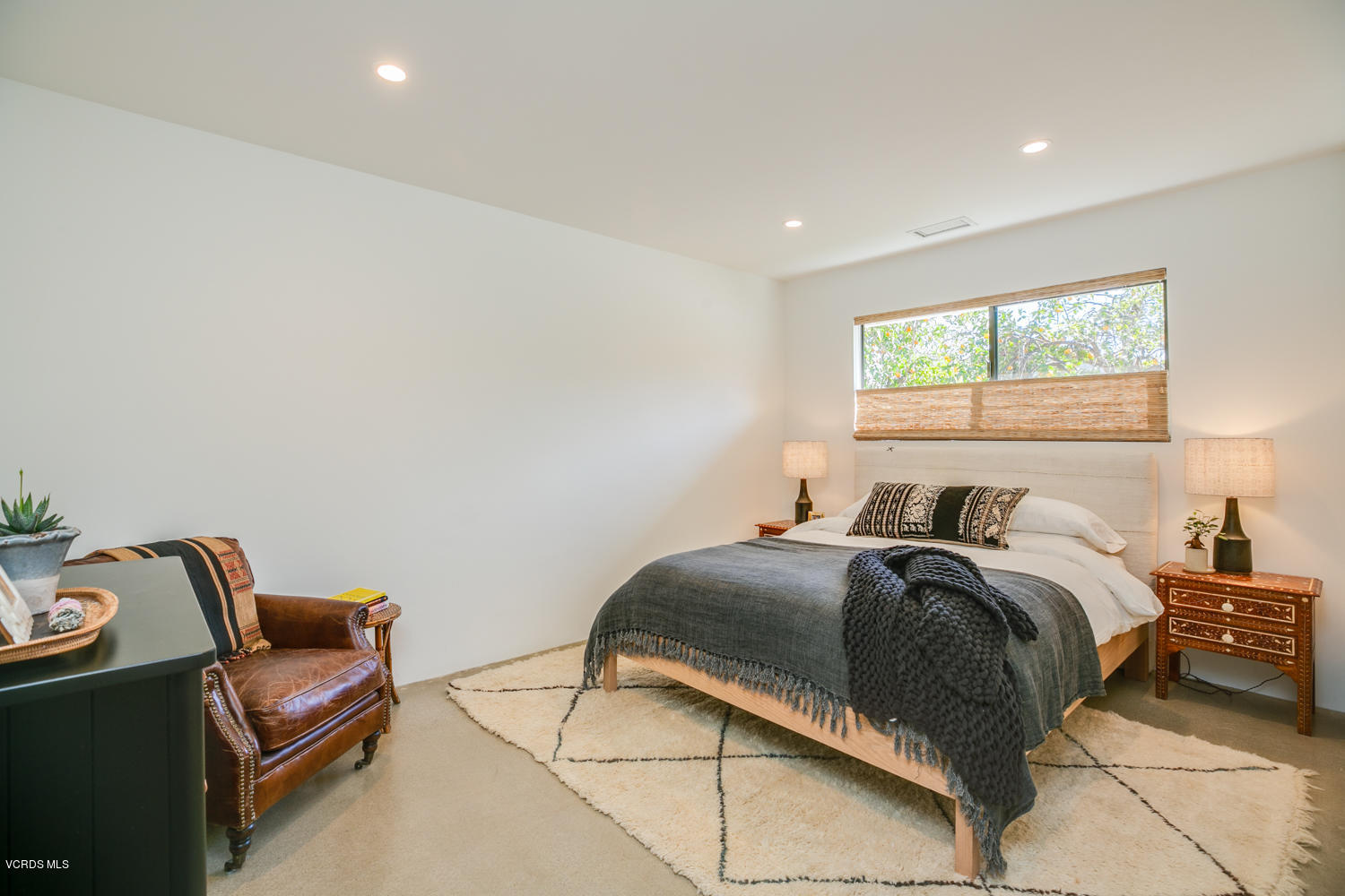 1203 Daly Road Ojai, CA 93023 - Photo 10 of 18 a room with a bed and a chair