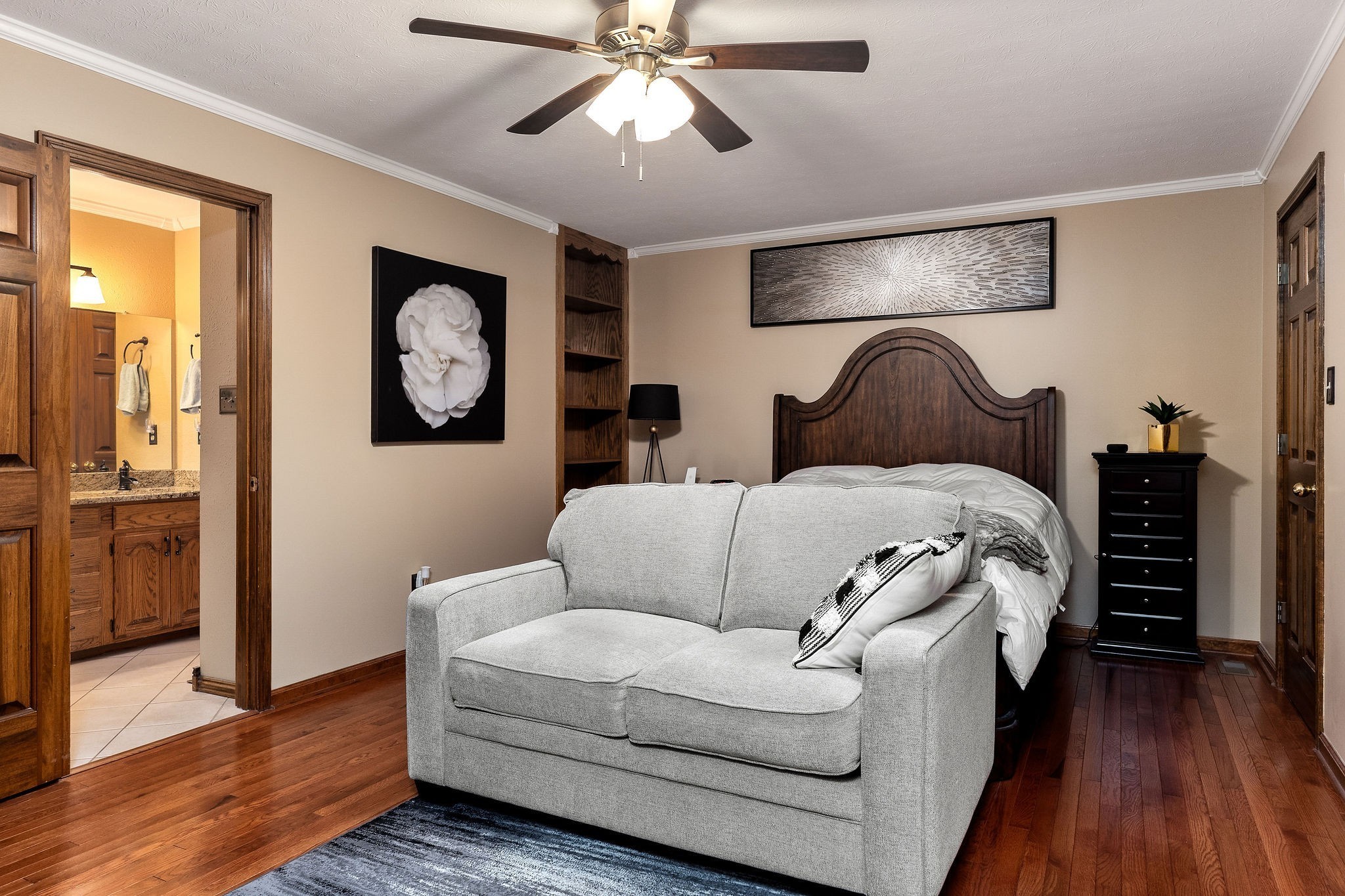 3579 Hilham Road Cookeville, TN 38506 - Photo 24 of 43 a bedroom with bed and a chandelier