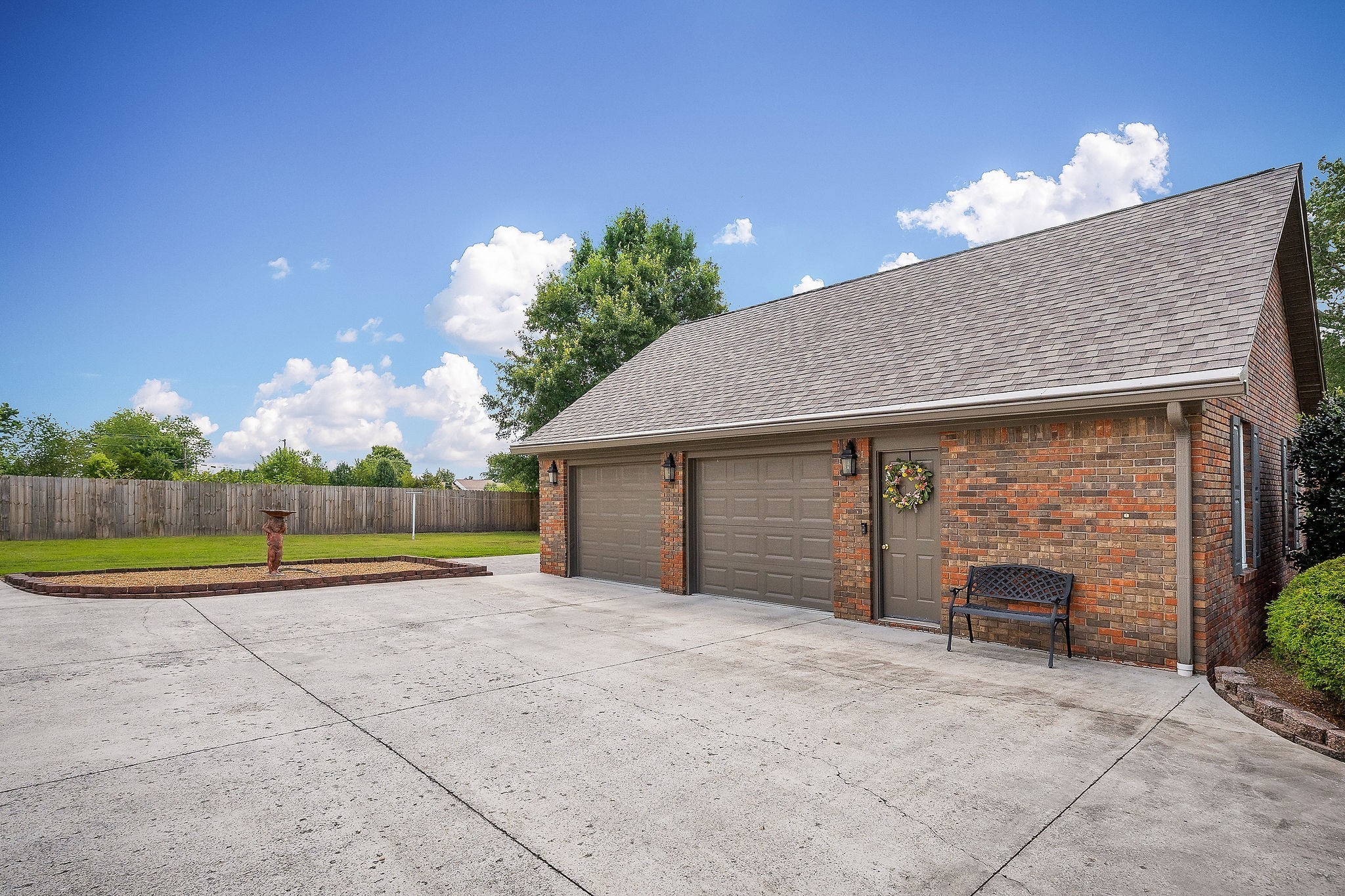 3579 Hilham Road Cookeville, TN 38506 - Photo 37 of 43 a view of a house with a yard and potted plants