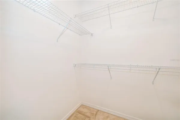 a view of a room with racks on the wall