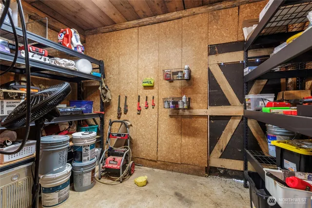 a view of a house with yard and sitting area
