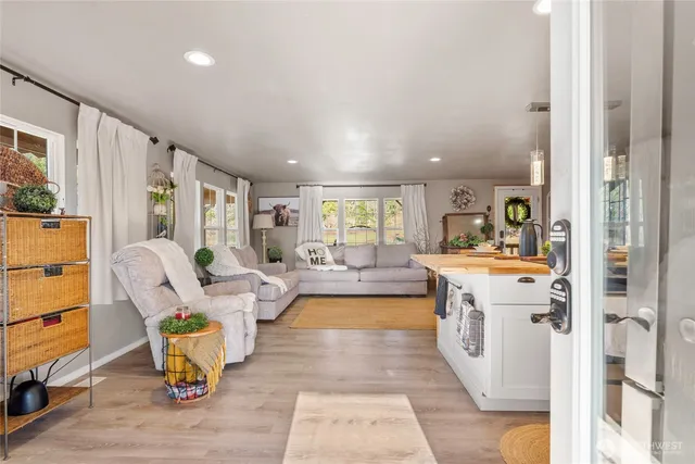 a living room with furniture and a table