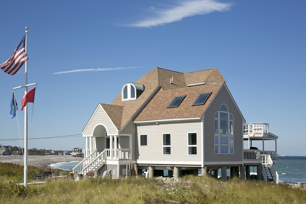 a aerial view of a house with swimming pool