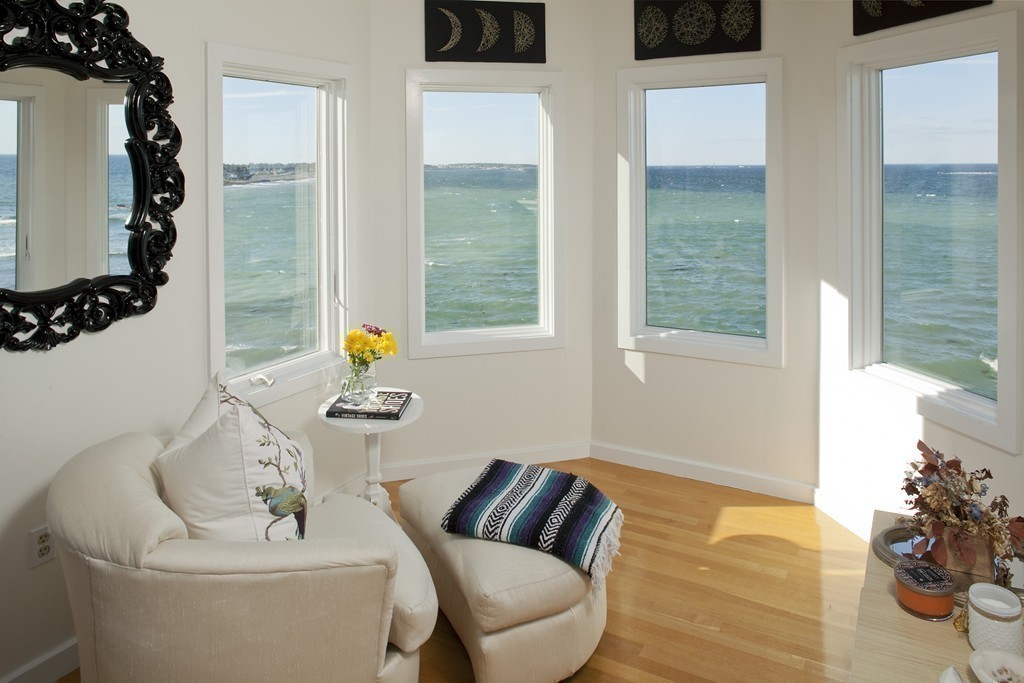 73 Seaside Road Scituate, MA 02066 - Photo 13 of 27 a living room with furniture and a potted plant
